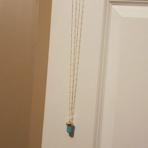 Gold plated neck with turquoise stone